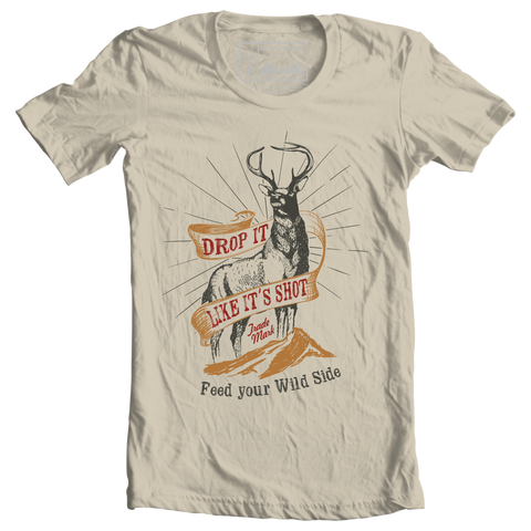 Khaki short sleeve t-shirt with buck graphic and saying Drop it like it's shot - feed your wild side